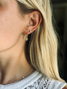 #2679 TINY PAVE CROSS HUGGIE